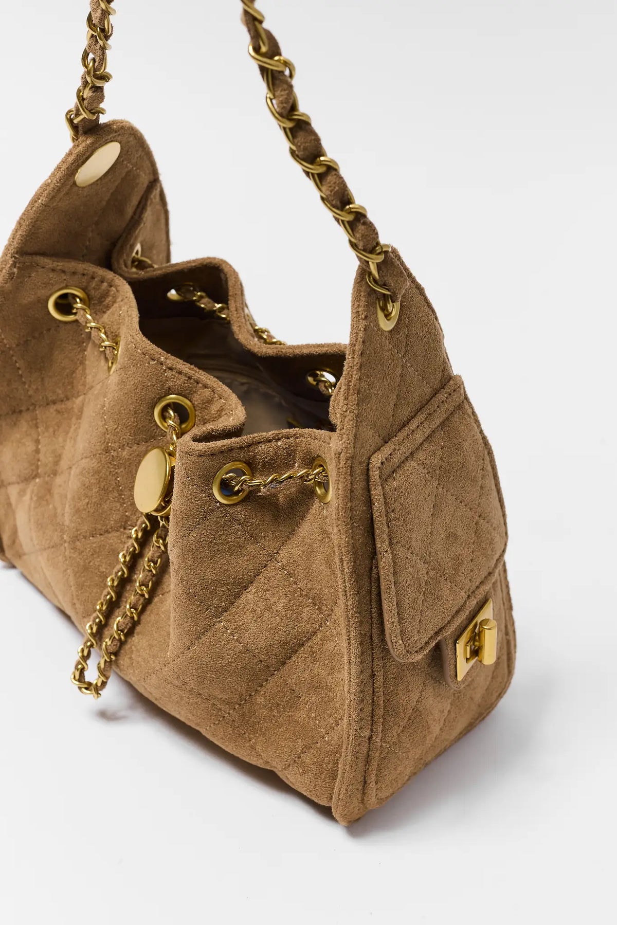 Tan Faux Suede Quilted Bucket Bag Open Interior with Side Pocket Detail | Avara