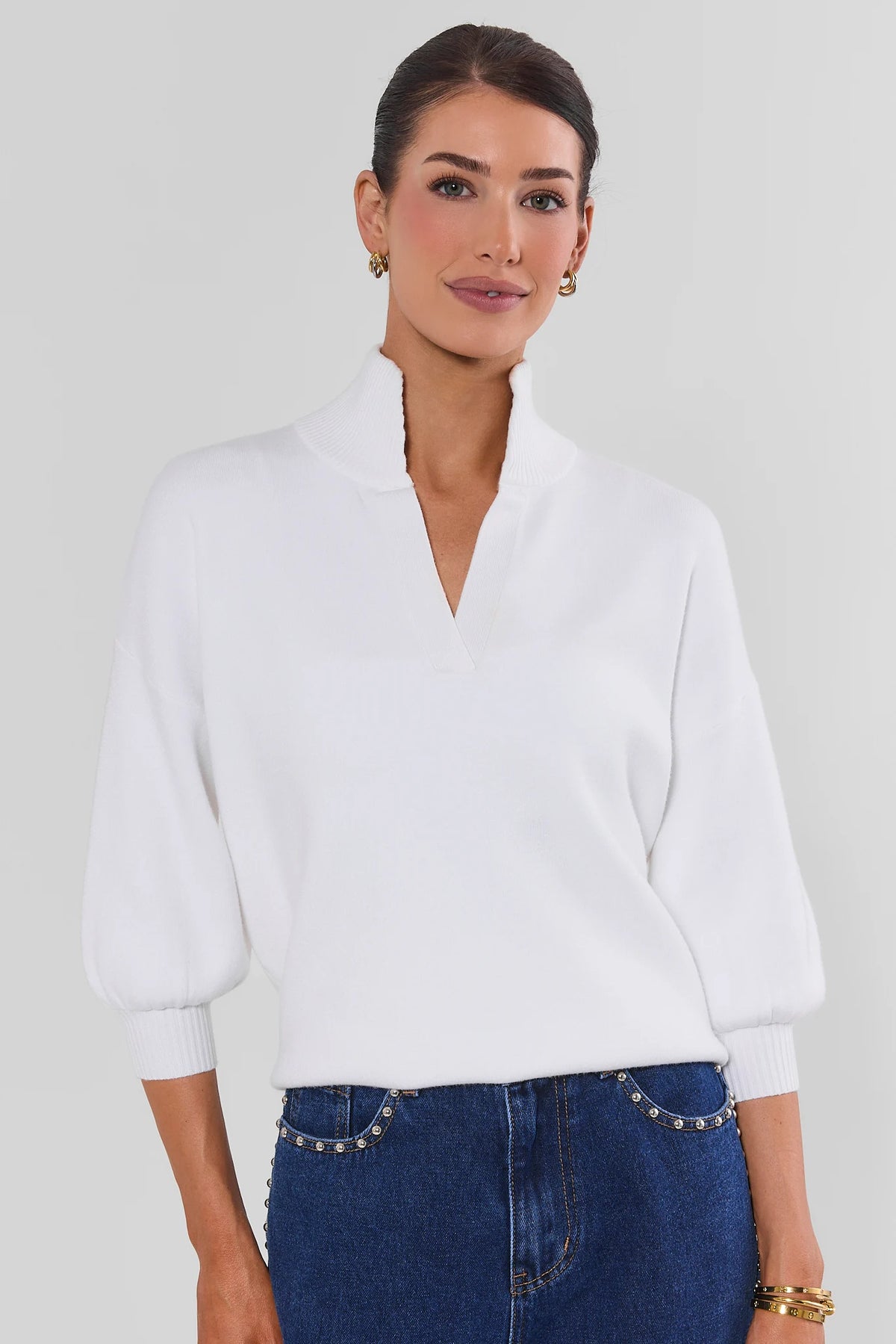 Gwyneth Cream Knit Sweater - Front View On Model with Studded Wide Leg Denim | Avara