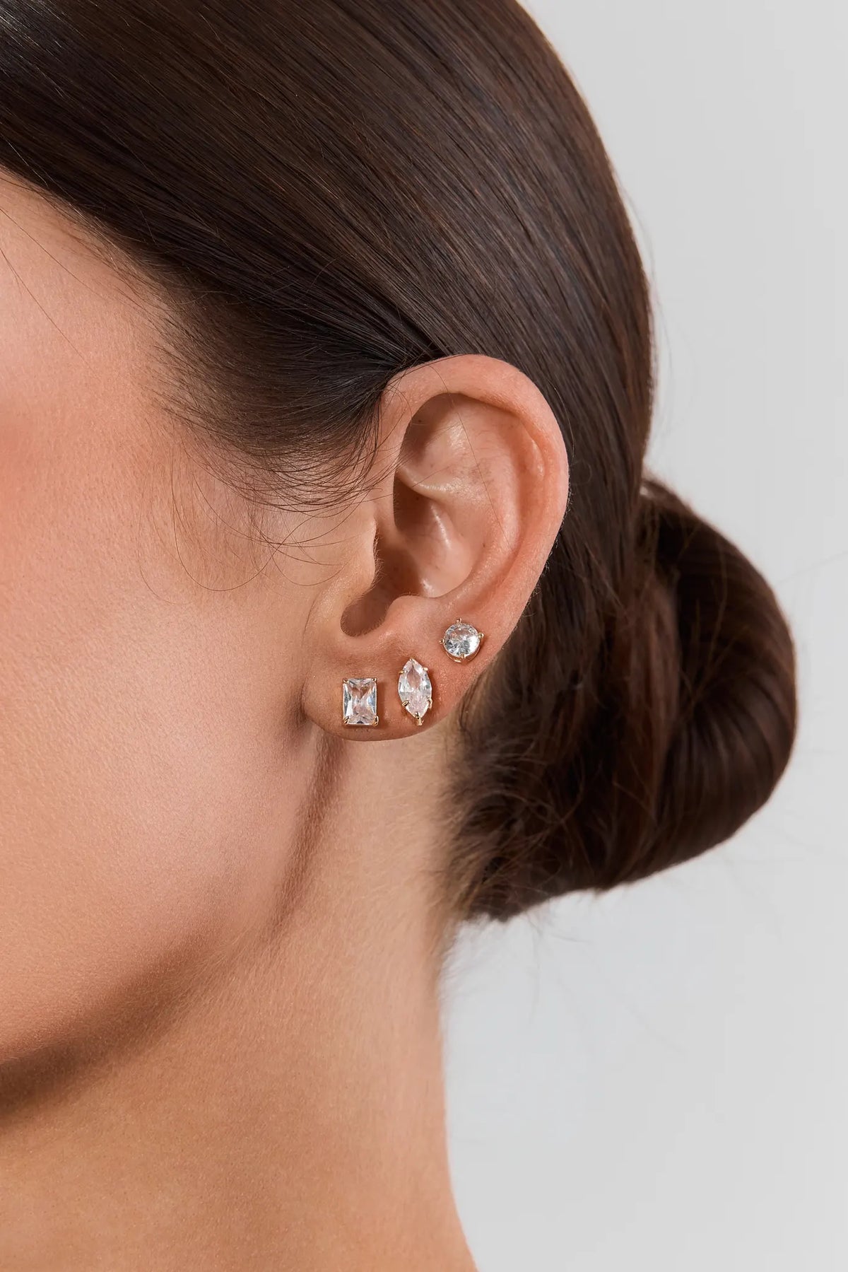 Clear Rhinestone Stud Earrings Set Styled On Model - Ear Detail | Avara