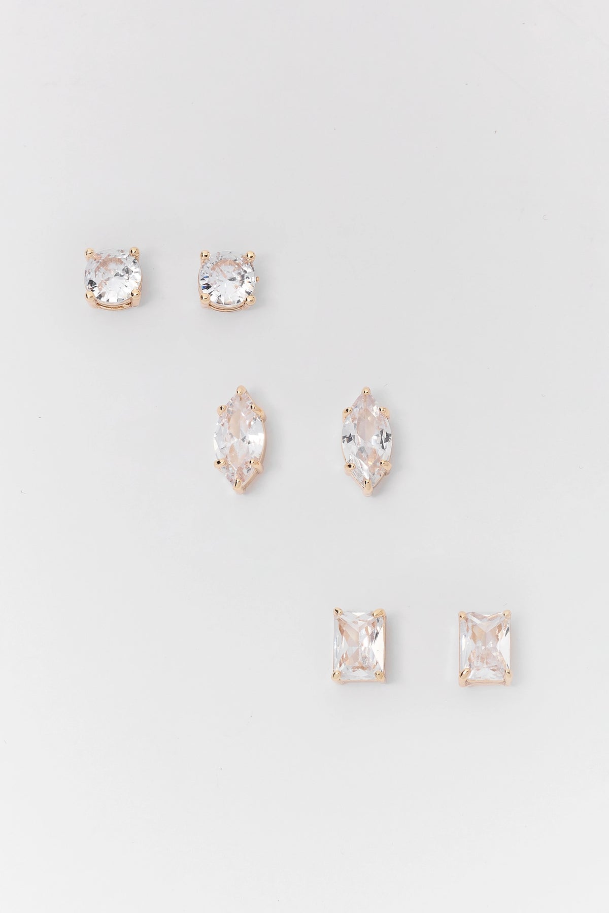 Clear Rhinestone Gold-Tone Stud Earrings Set of 3 - Flat Lay | Avara