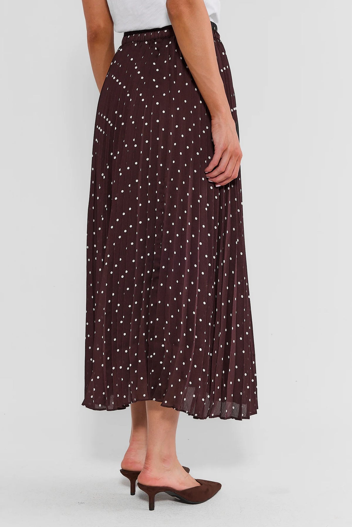 Brown Polka Dot Pleated Midi Skirt - Back View On Model | Avara