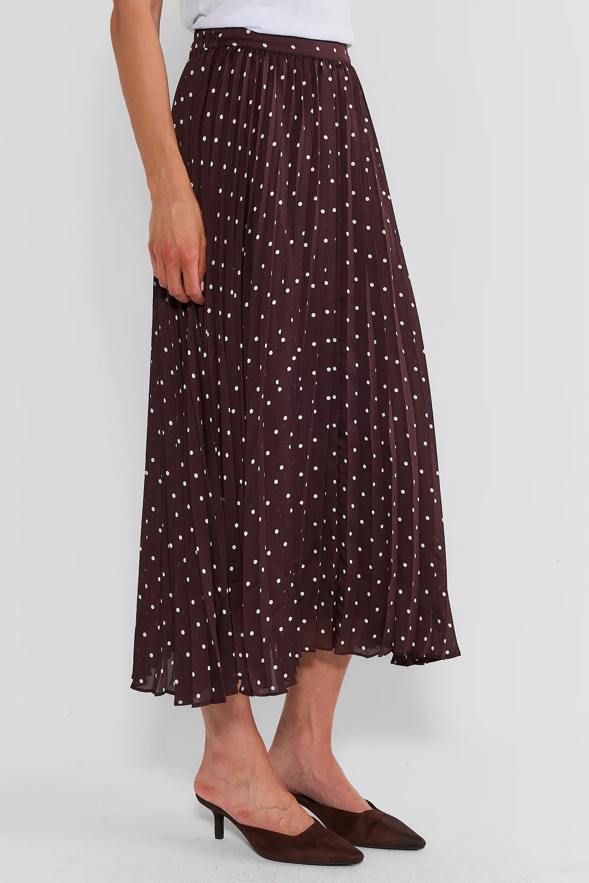 Brown Polka Dot Pleated Midi Skirt - Side Profile On Model | Avara