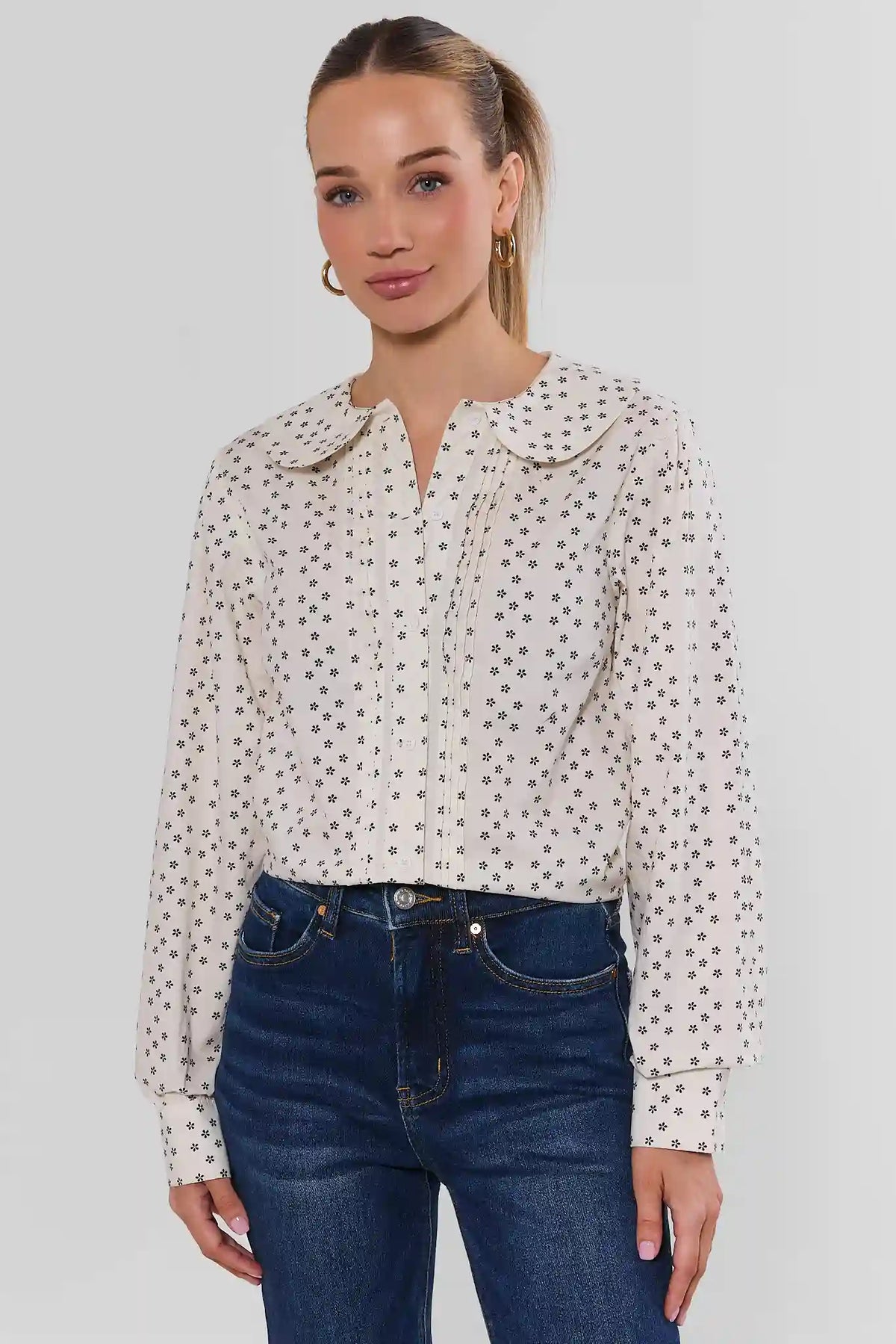 White Floral Print Peter Pan Collar Top - Front View, Styled with Dark Denim | Avara