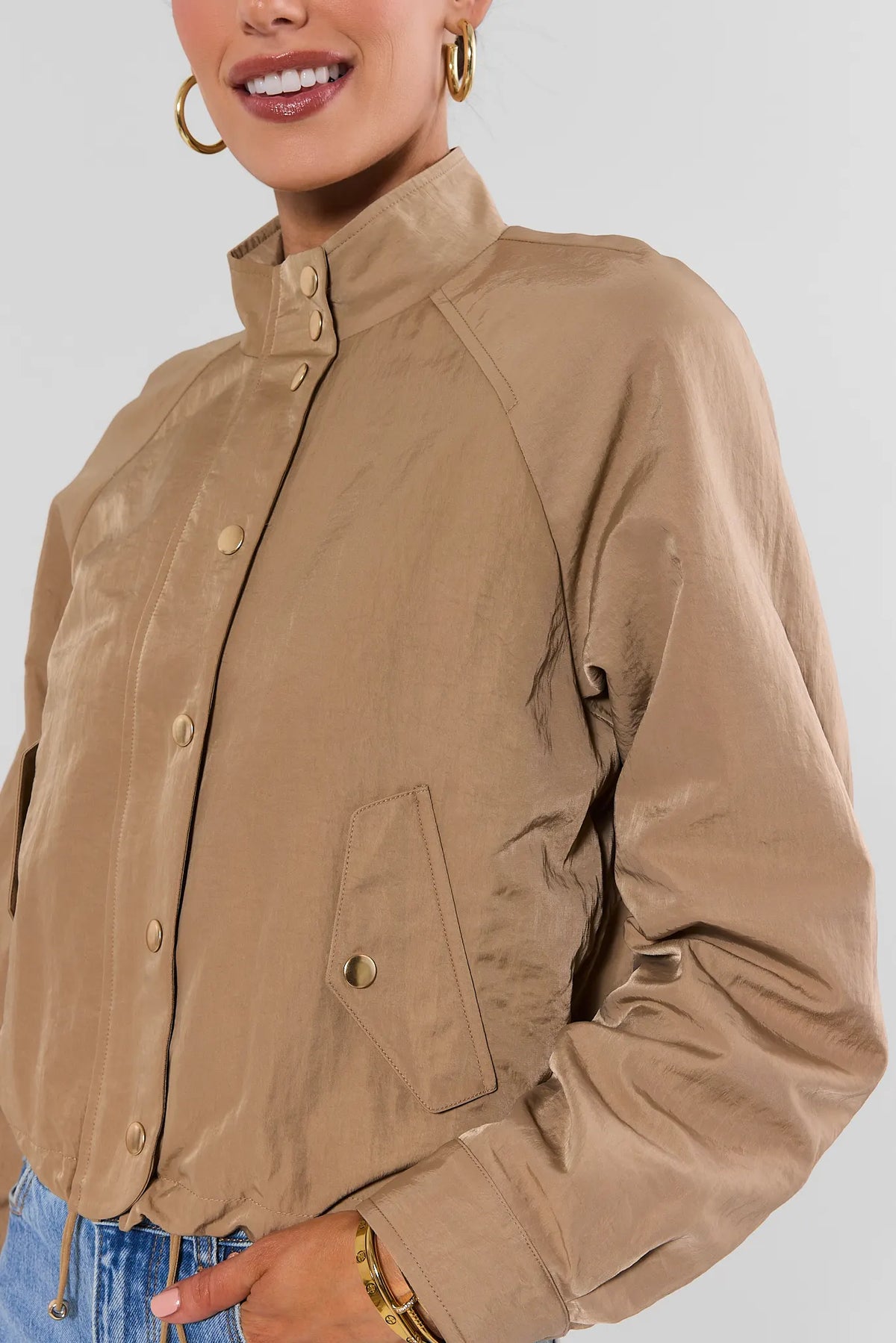 Taupe Cropped Bomber Jacket - Close-Up Front Detail, Gold Snaps and Mock Collar | Avara