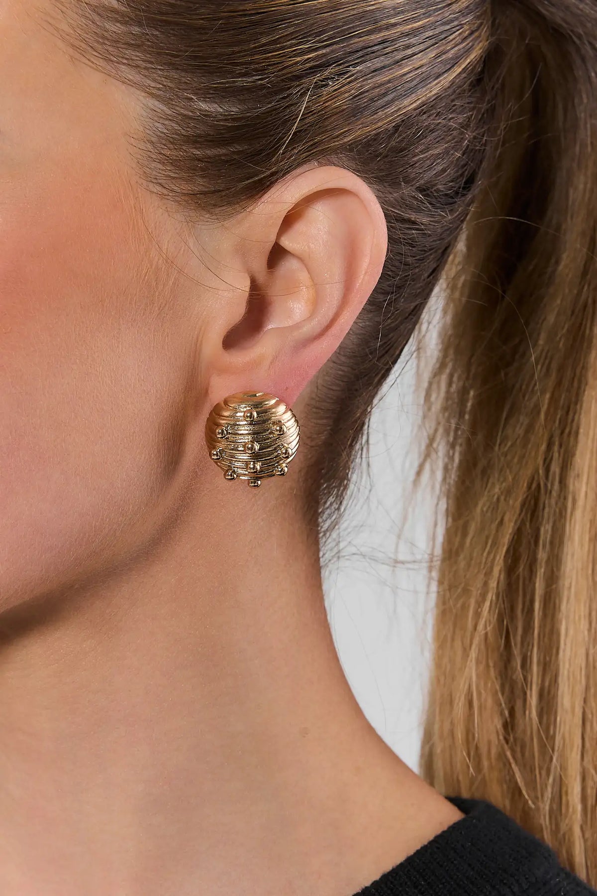 Gold Oversized Stud Earrings - On Model Ear Close-Up | Avara