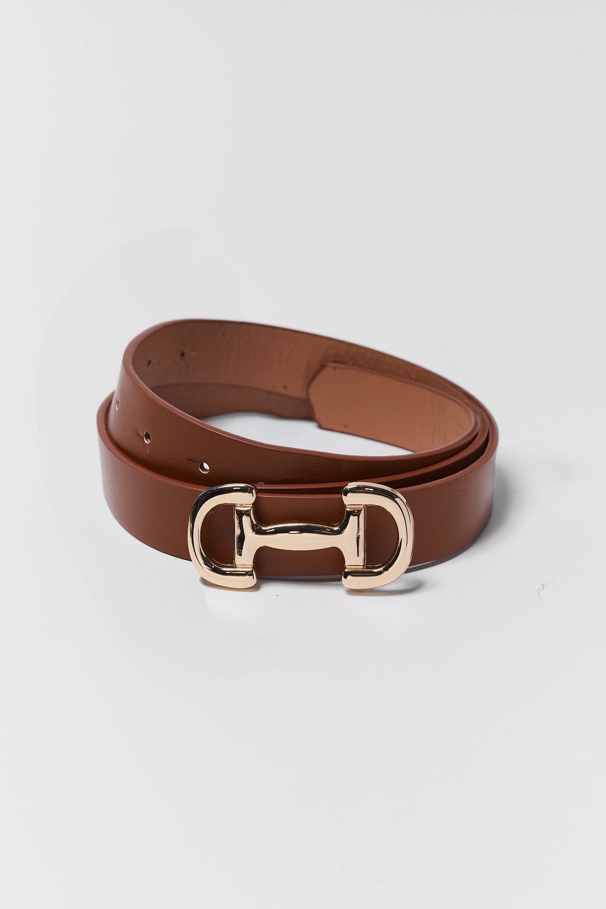 Brown Faux Leather Horse Bit Buckle Belt - Coiled Flat Lay, Gold Hardware | Avara