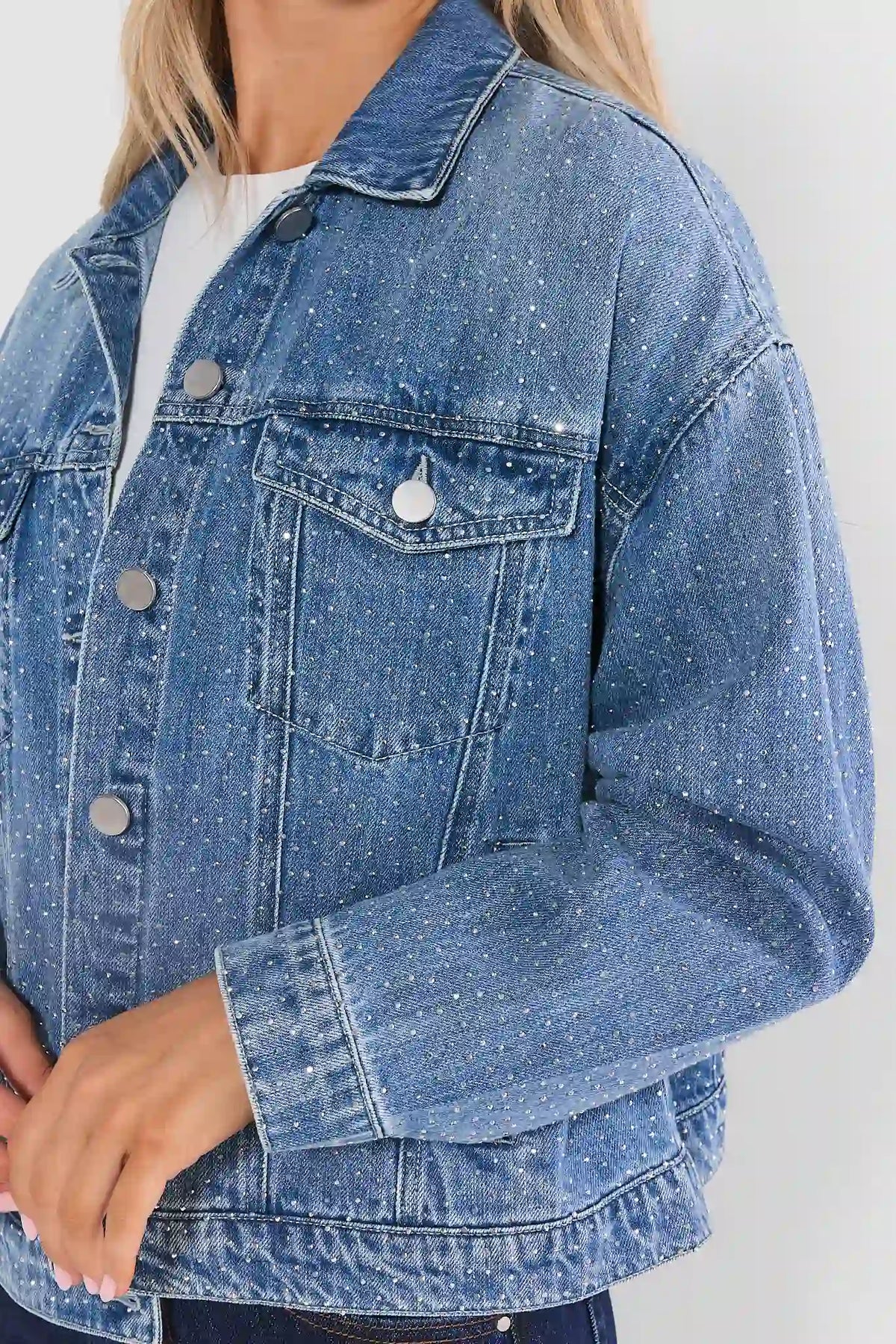 Medium Wash Rhinestone Denim Jacket - Close-Up Crystal Embellishment & Chest Pocket Detail | Avara