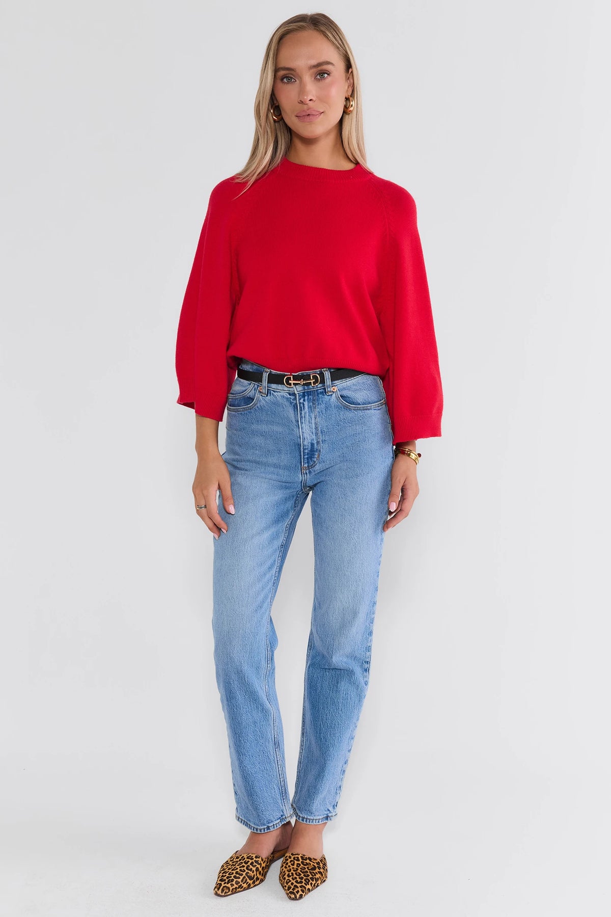 Red Ribbed Waist Sweater - Full-Length Front View Styled with Light Wash Jeans | Avara