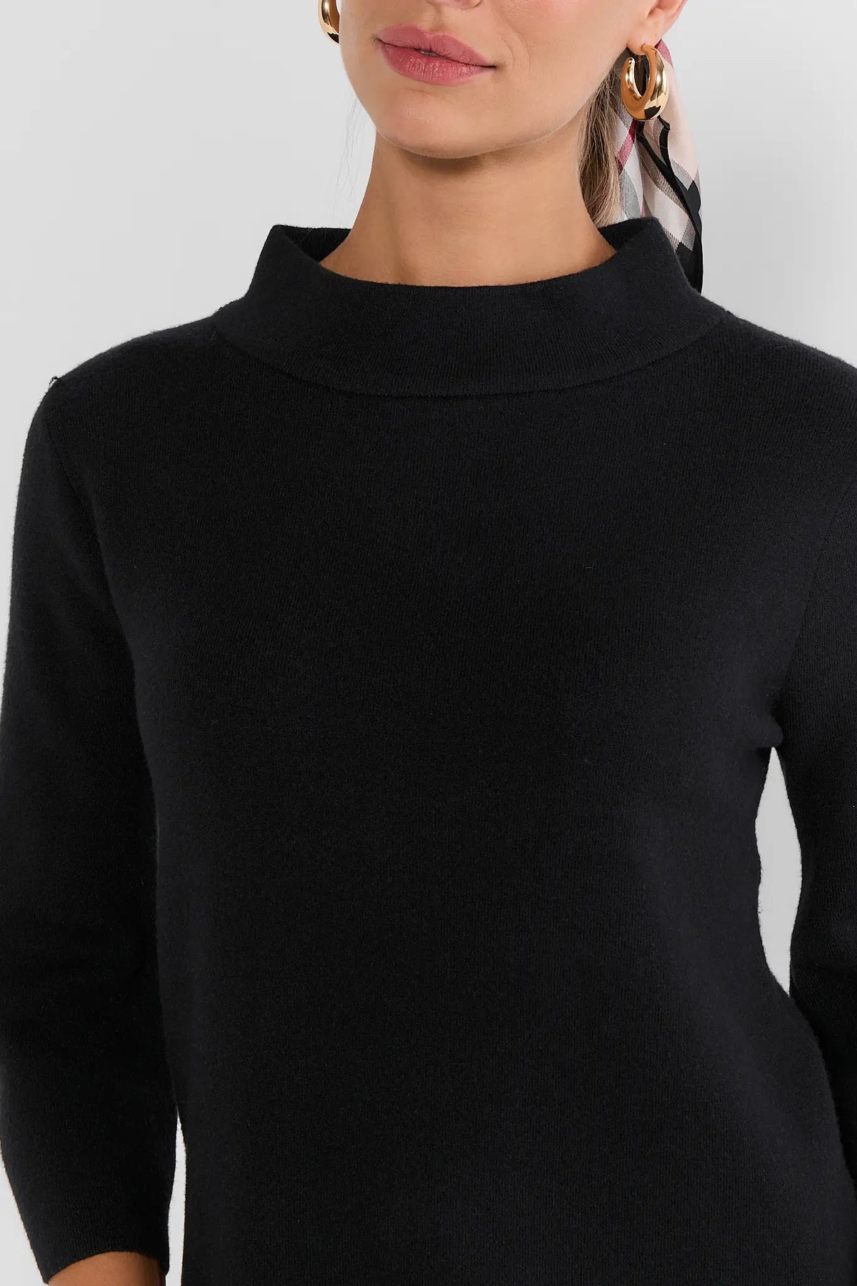 Black Knit Short Dress Mock Neck Detail Close-Up - Front View | Avara