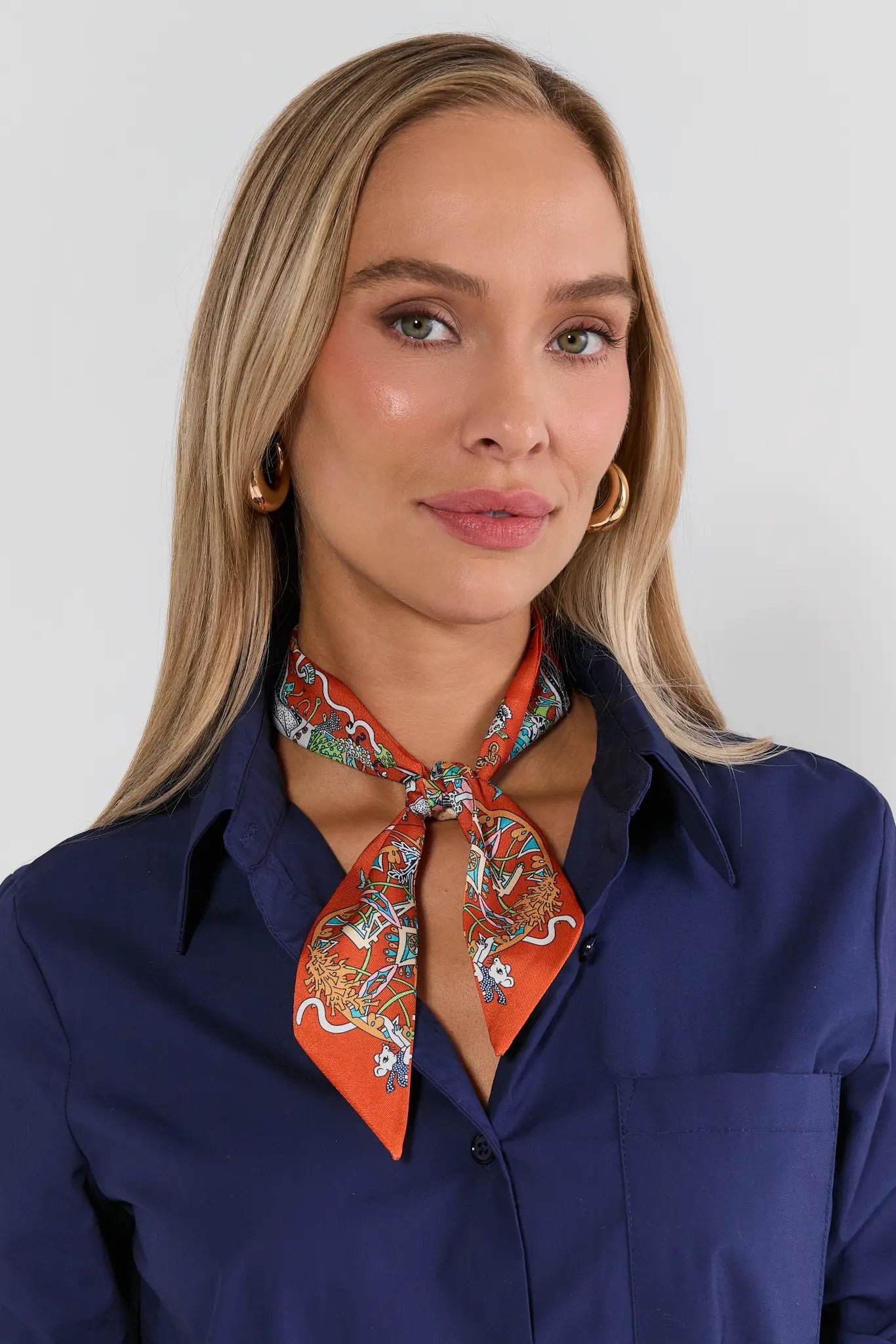 Orange Printed Skinny Scarf Knotted at Neck - On Model Front View | Avara
