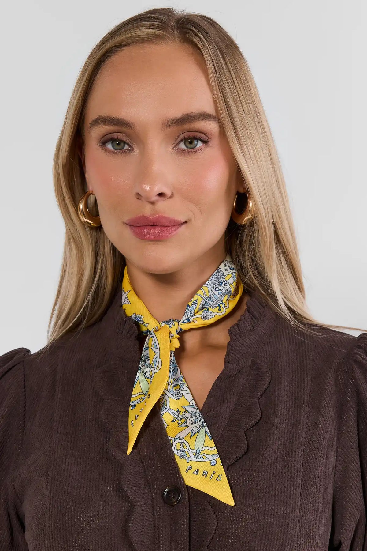 Yellow Printed Skinny Scarf tied at neckline - On Model Front View | Avara