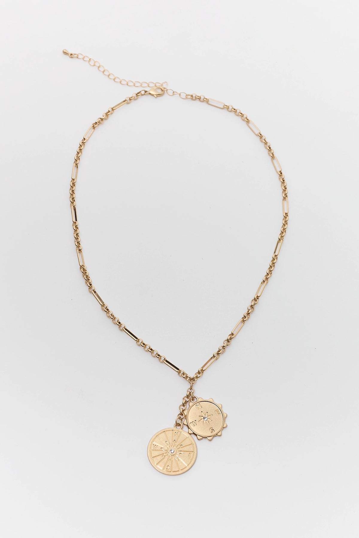 Gold Compass Charm Necklace with Dual Coin Pendants - Flat Lay | Avara