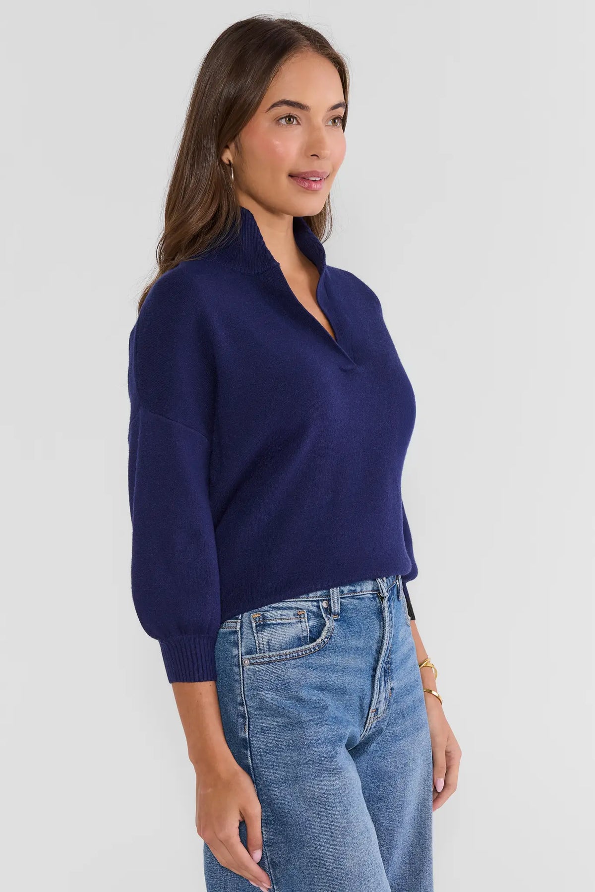 Navy Knit Sweater - Three-Quarter Side View Showing Stand Collar and Puff Sleeves | Avara