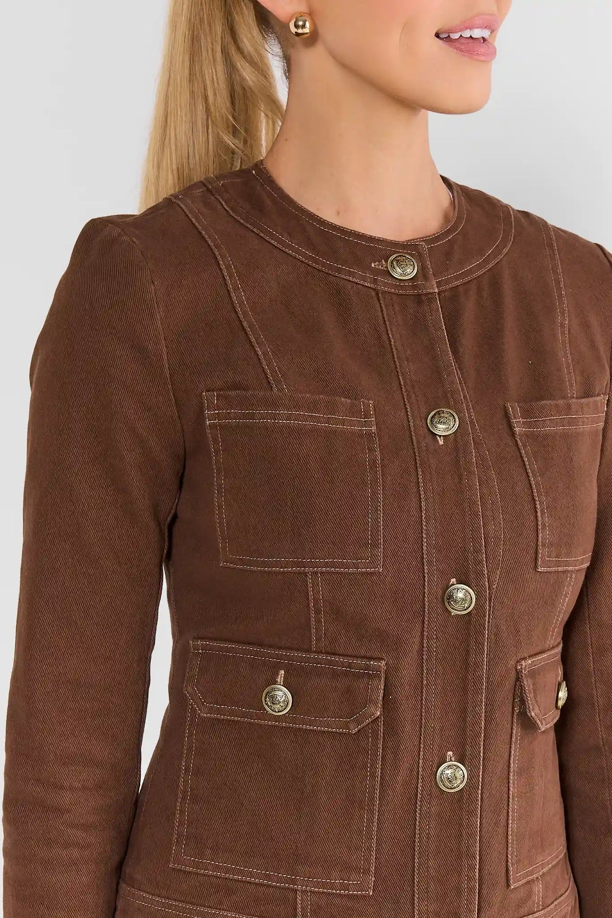 Brown Tailored Jacket - Front Pocket & Gold Button Detail On Model | Avara