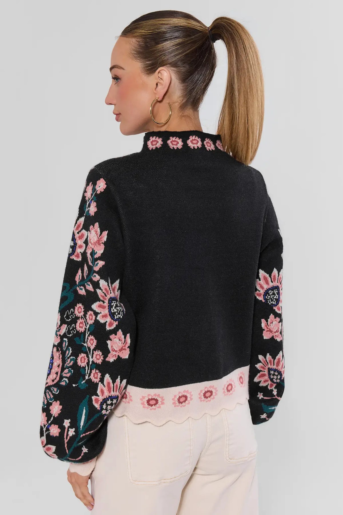 Black Floral Knit Sweater - Back View On Model, Floral Sleeve Detail | Avara