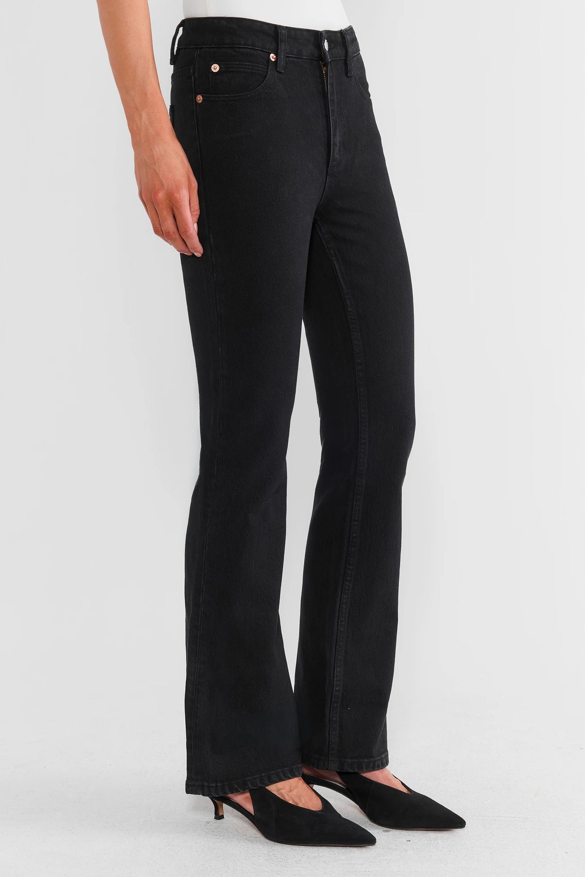 Black Denim Bootcut Jeans - Side Profile View, On Model | Avara