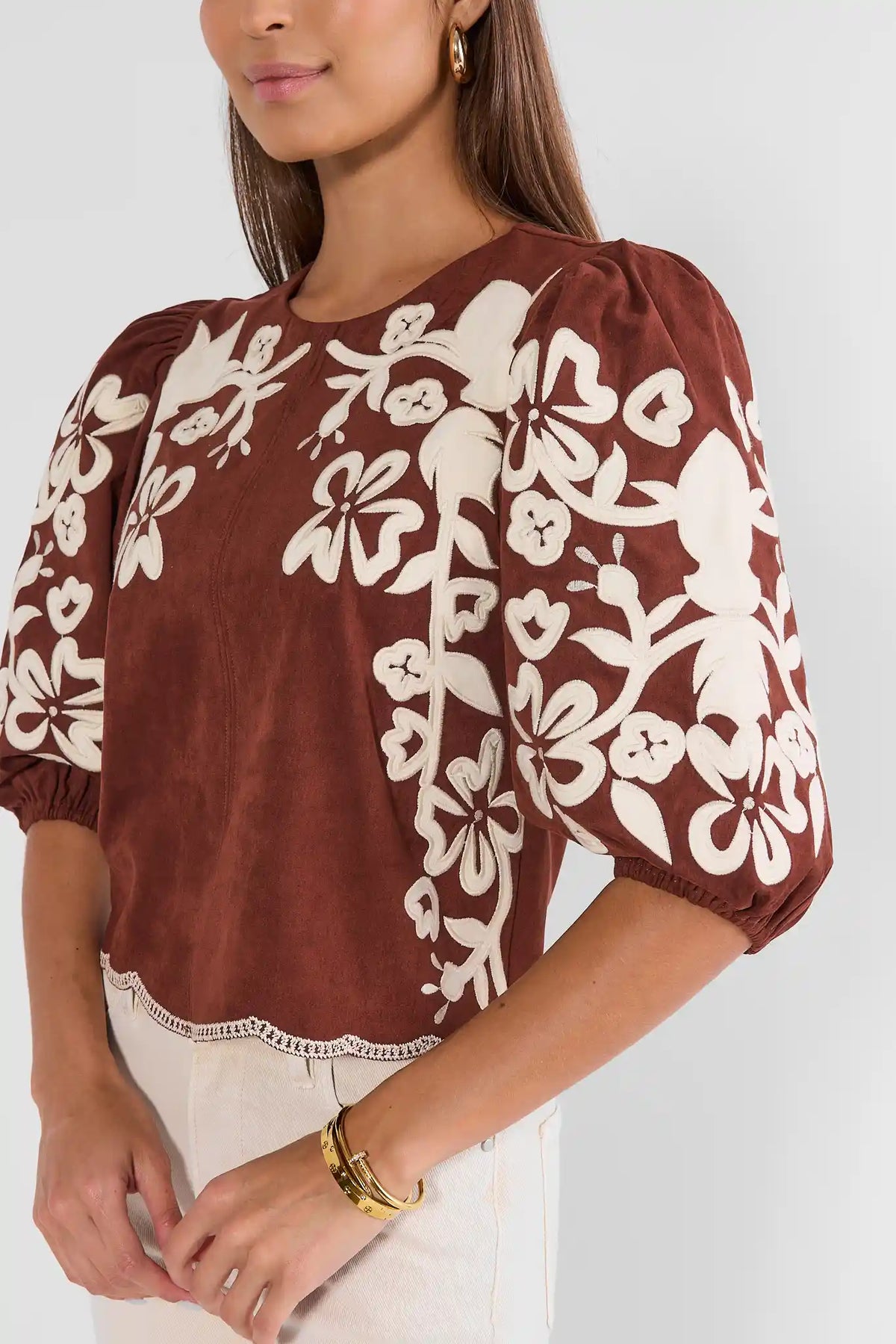 Brown Faux Suede Top with Cream Floral Appliqué - Close-Up Detail On Model | Avara