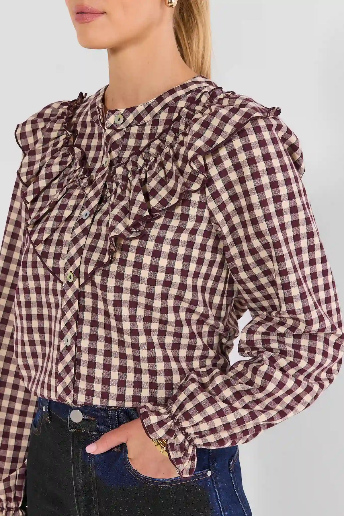 Brown Gingham Long Sleeve Ruffle Top - Side Angle On Model with Jeans | Avara