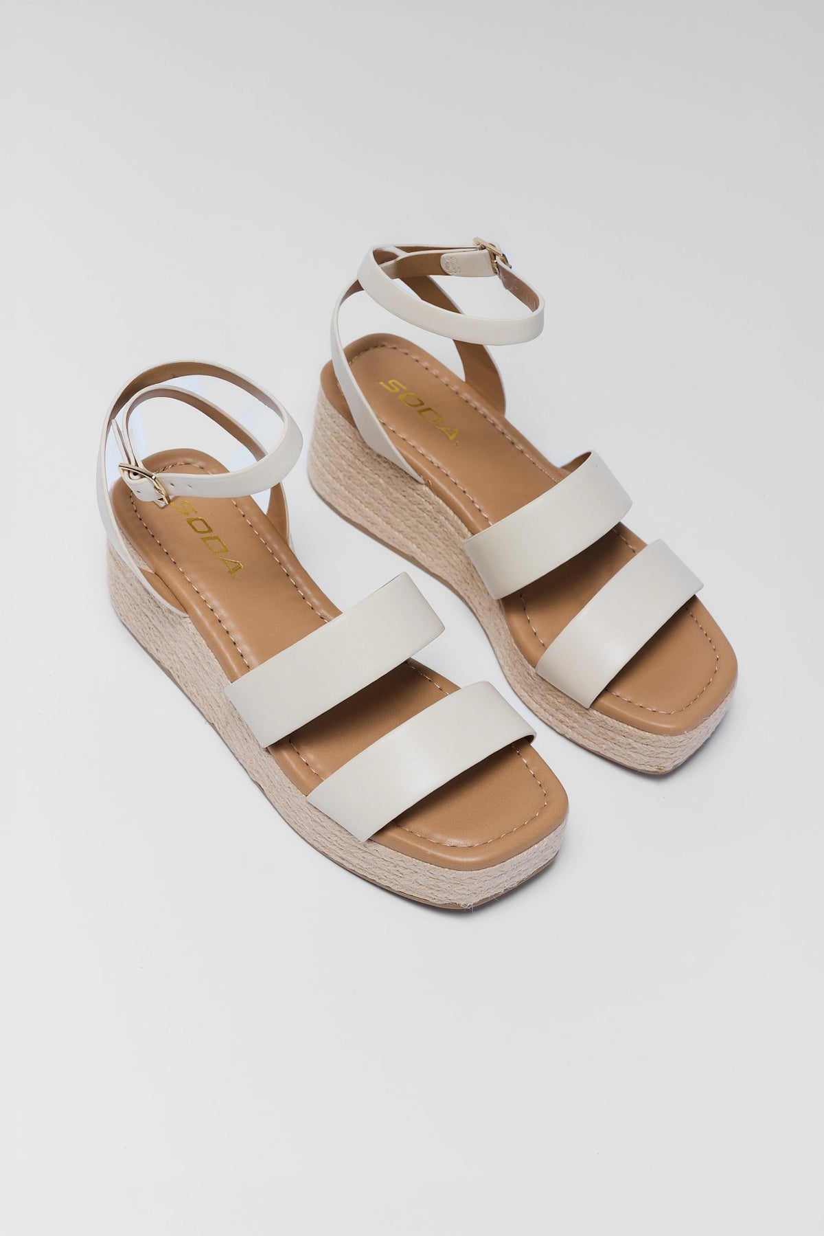White Strap Braided Wedges Pair - Front Angle Flat Lay | Avara