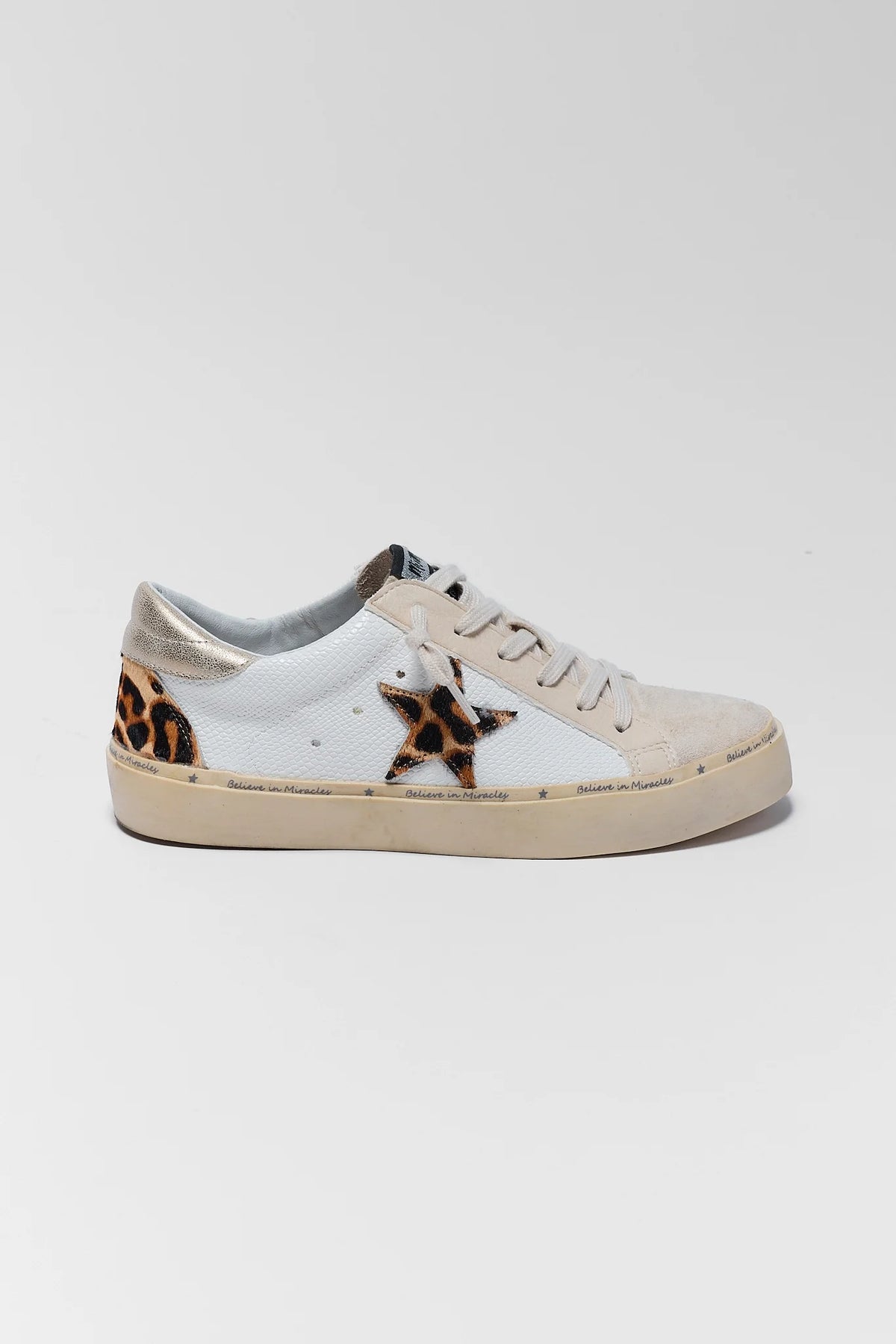White Leopard Print Star Sneaker - Side Profile, leopard star patch and gold metallic heel accent | Avara
