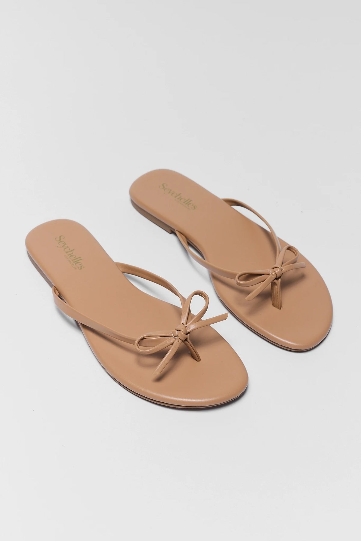 Seychelles Wish List Tan Sandals with bow detail - Angled Top View | Avara