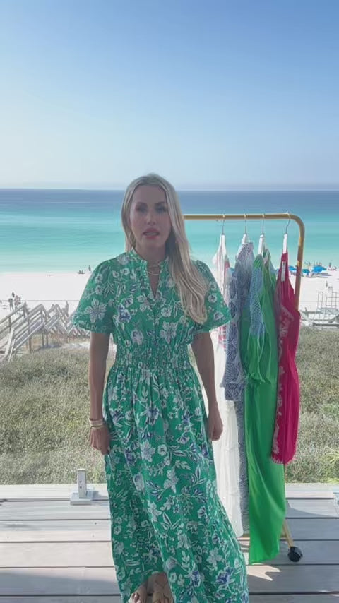 woman wearing isabella dress with beach in background