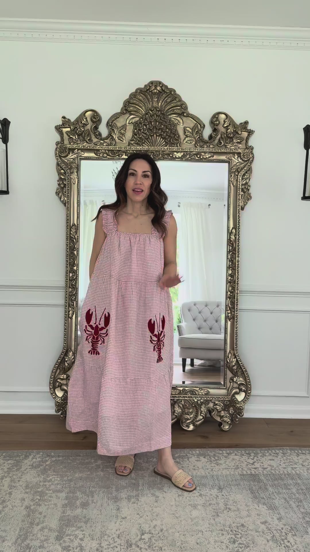 woman wearing lobster embroidered dress