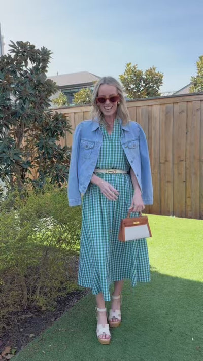 woman wearing green gingham set outdoors