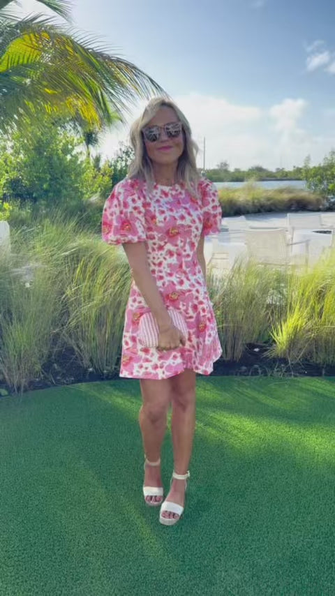 woman wearing ruth pink short dress