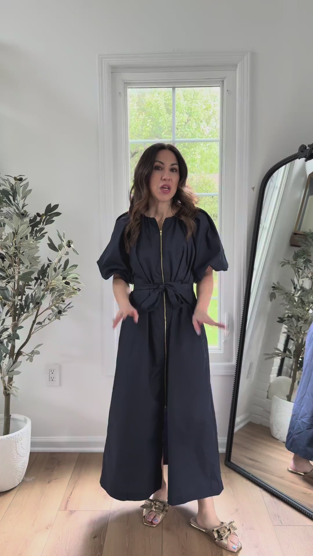 woman wearing navy meadow dress
